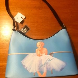 Small baby blue Marilyn Monroe purse.